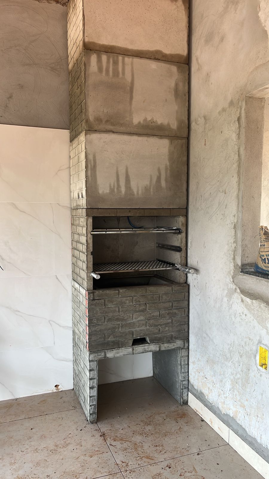 Churrasqueira predial instalada em varanda